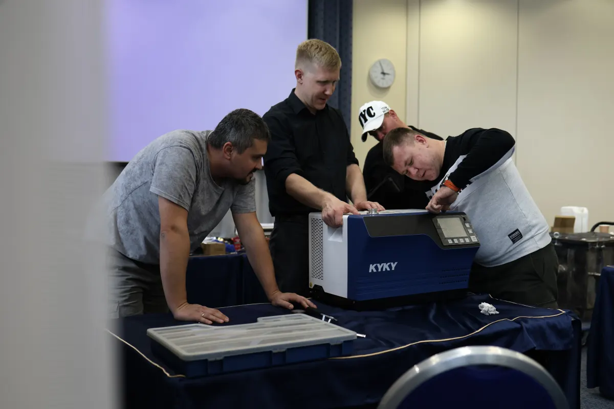 Helium leak detector operation practice during a VacMentor training course