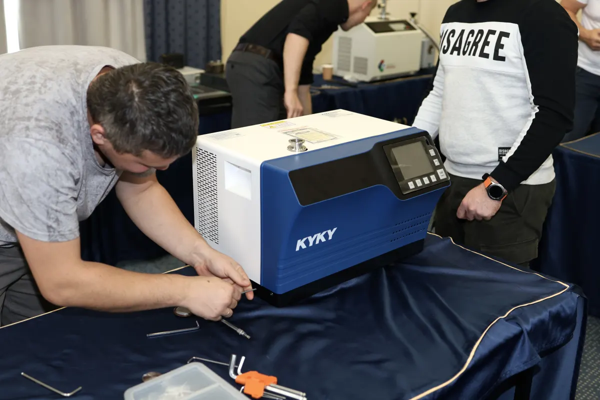 Helium leak detector operation practice during a VacMentor training course
