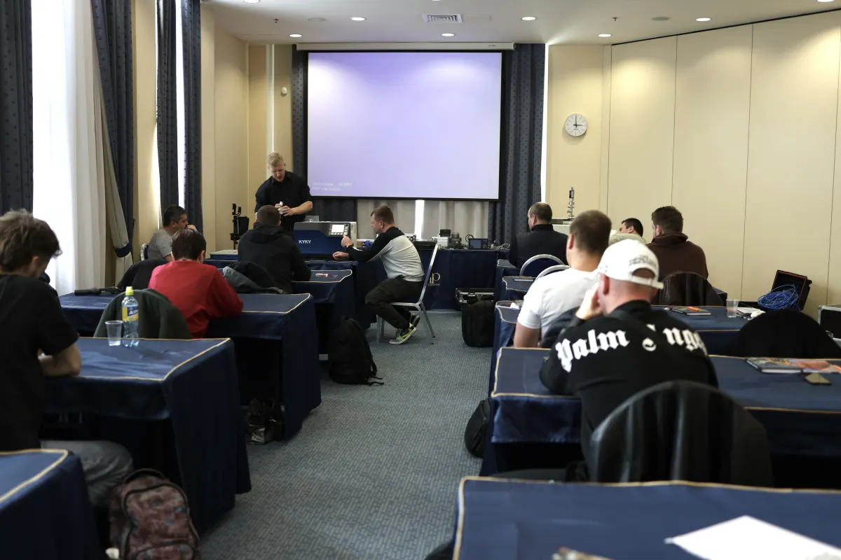 Helium leak detector operation practice during a VacMentor training course