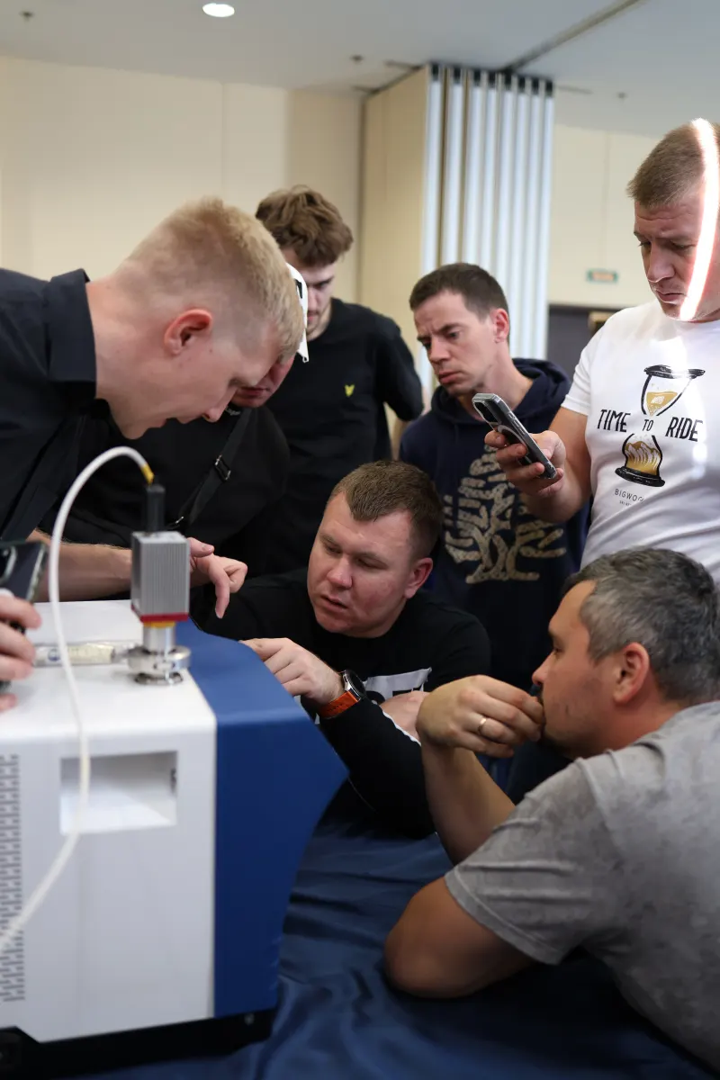 Helium leak detector operation practice during a VacMentor training course