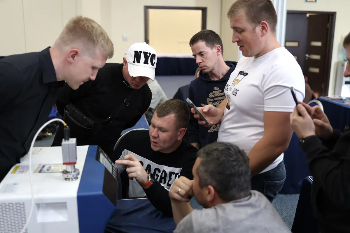 Helium leak detector operation practice during a VacMentor training course