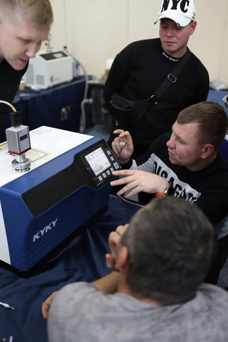 Helium leak detector operation practice during a VacMentor training course