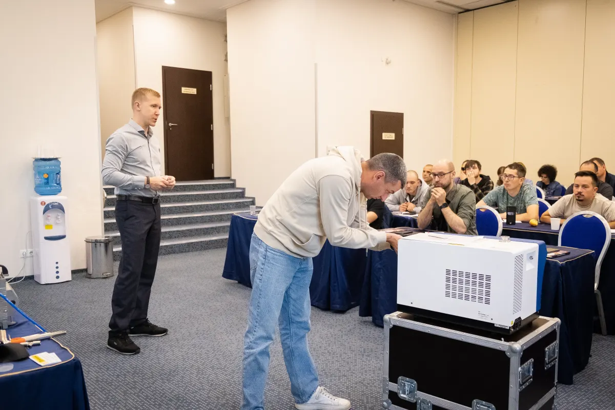 VacMentor instructor demonstrating leak testing equipment to course participants