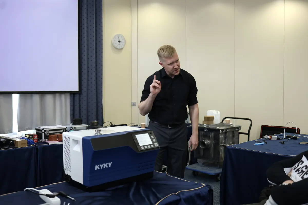 VacMentor instructor demonstrating leak testing equipment to course participants