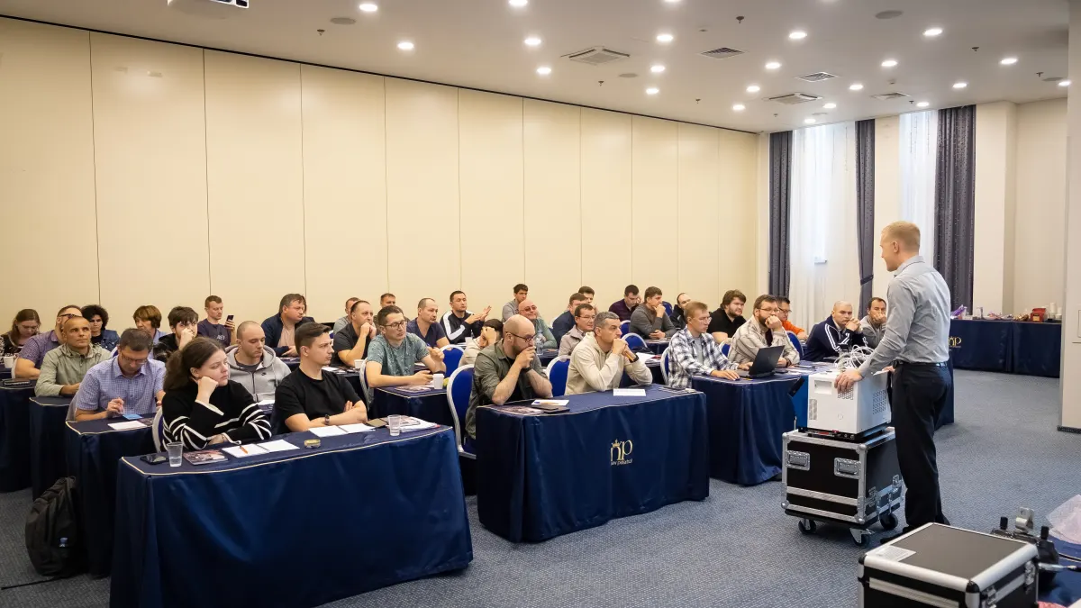 Instructor leading a VacMentor course with leak testing equipment in the classroom